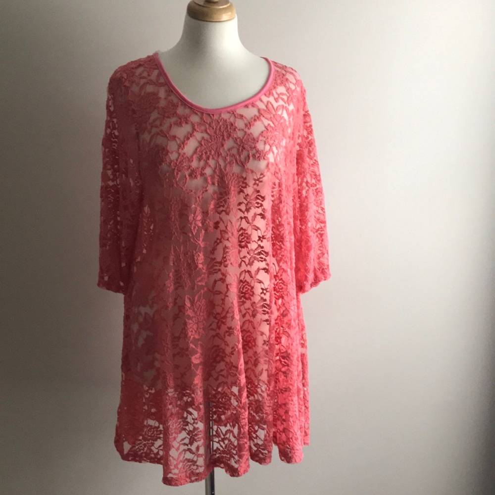 A. Orange sheer lace top with flower designs NWT